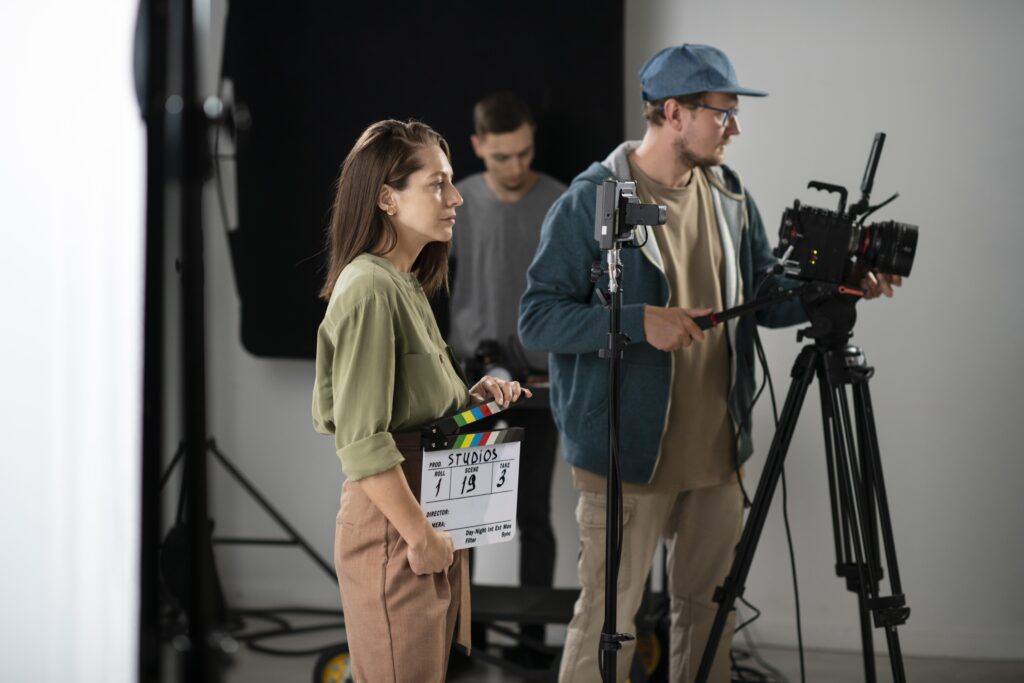 man-filming-with-professional-camera